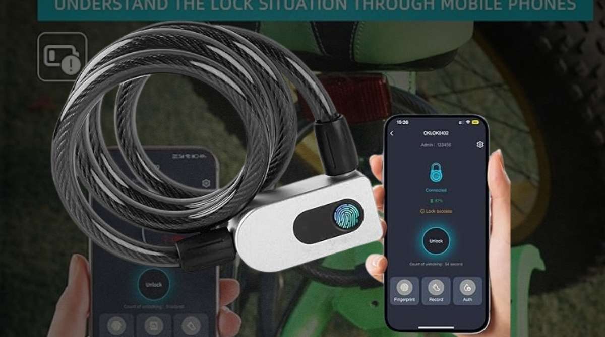 Smart fingerprint bike lock coiled around a bicycle with a mobile phone displaying the lock app interface.